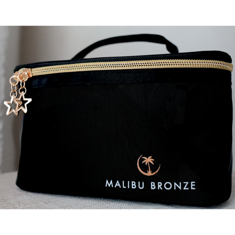 Malibu Bronze Large Travel bag displayed with star chain charm zipper and top handle. 